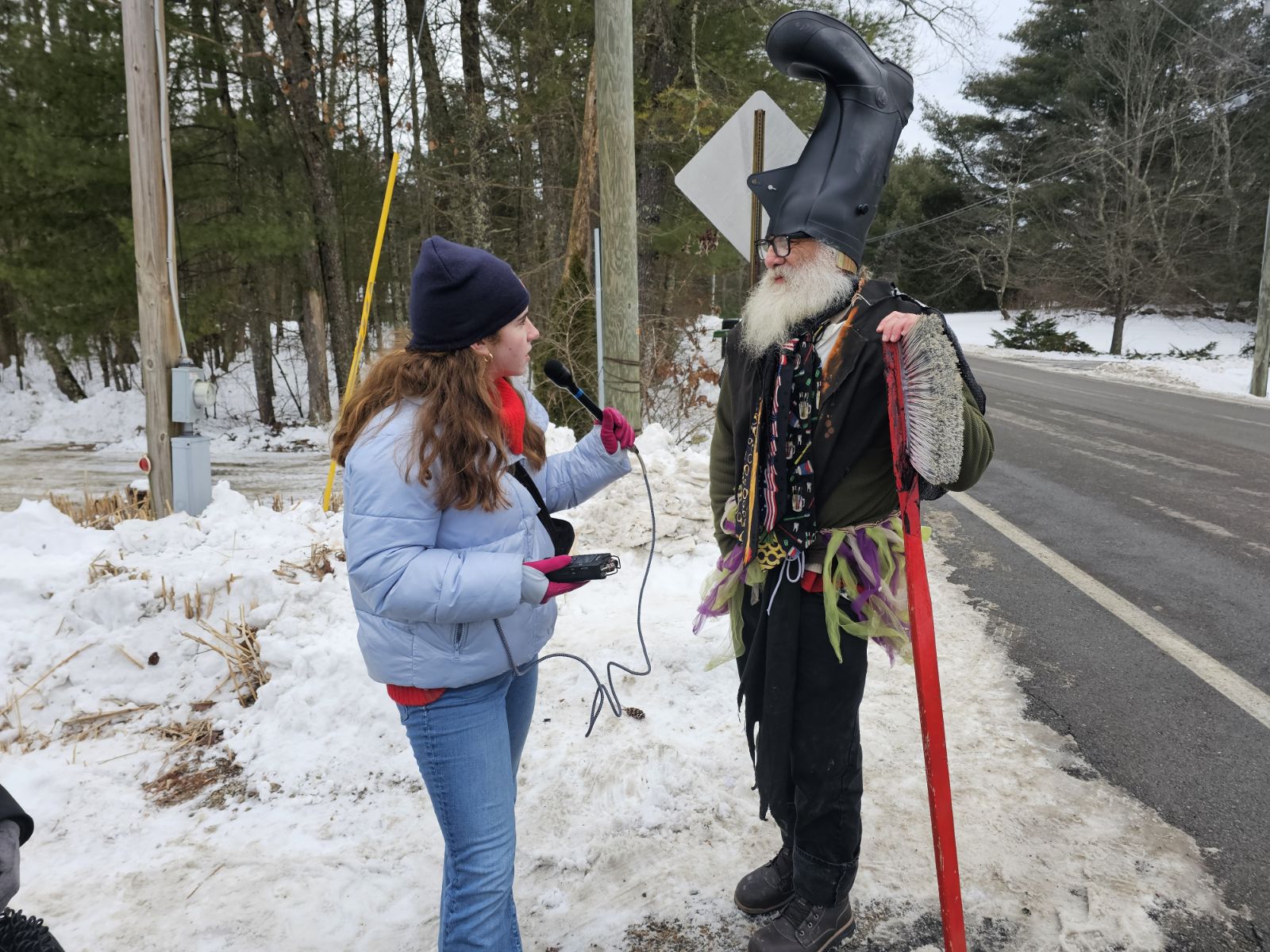 An image of Kate Bynum interviewing satirical presidential candidate Vermin Supreme